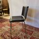 Vintage chair in black faux leather and chrome metal