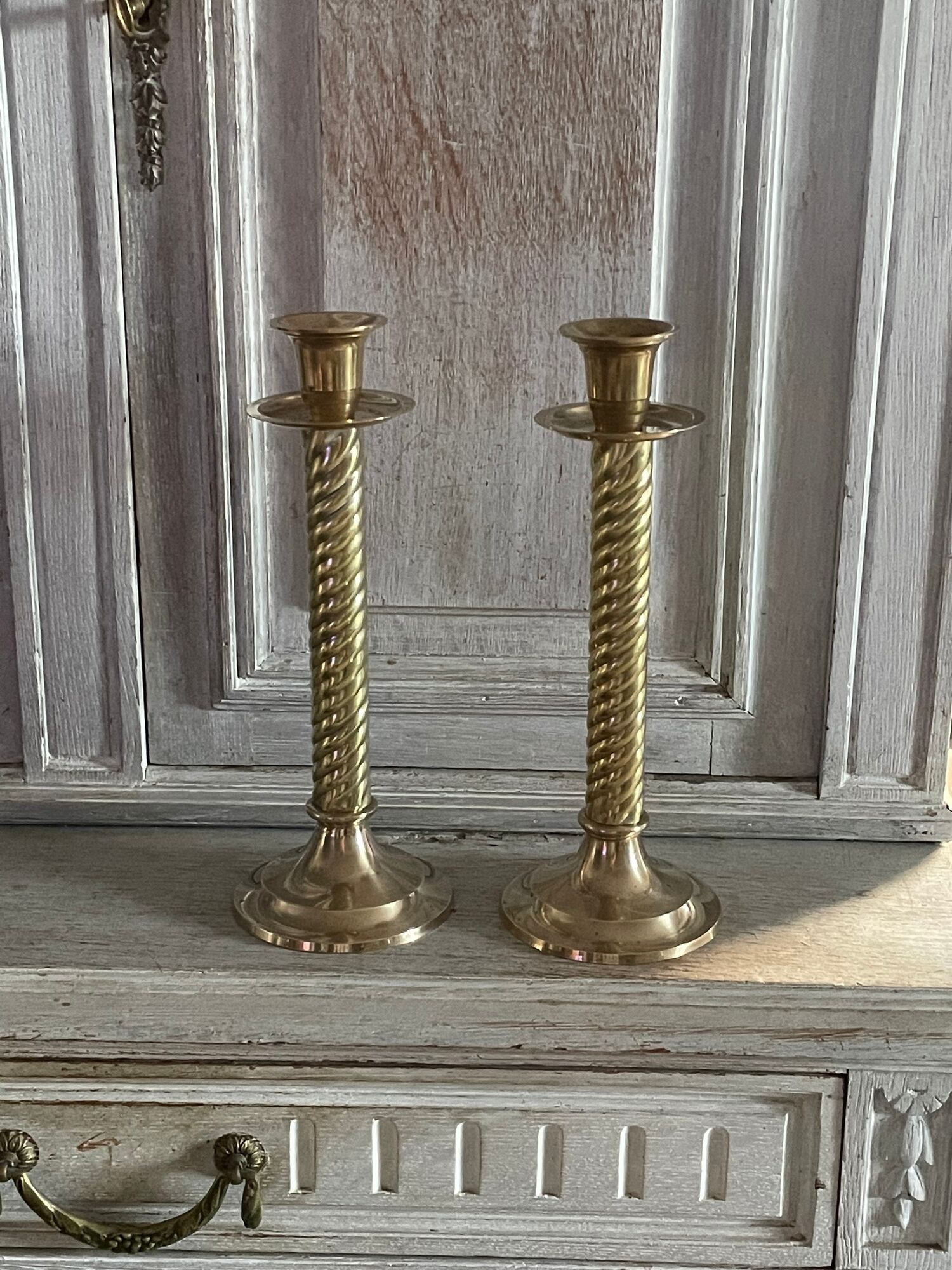 Pair of twisted brass column candle holders