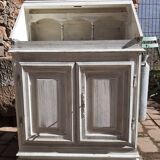 White patinated wooden sideboard