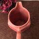 Old pitcher in earthenware of a very pretty pink