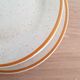 Set of 5 dessert plates + 6 speckled plates with Havana edging “Bachy”