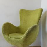 Bucket seat in chrome and green.