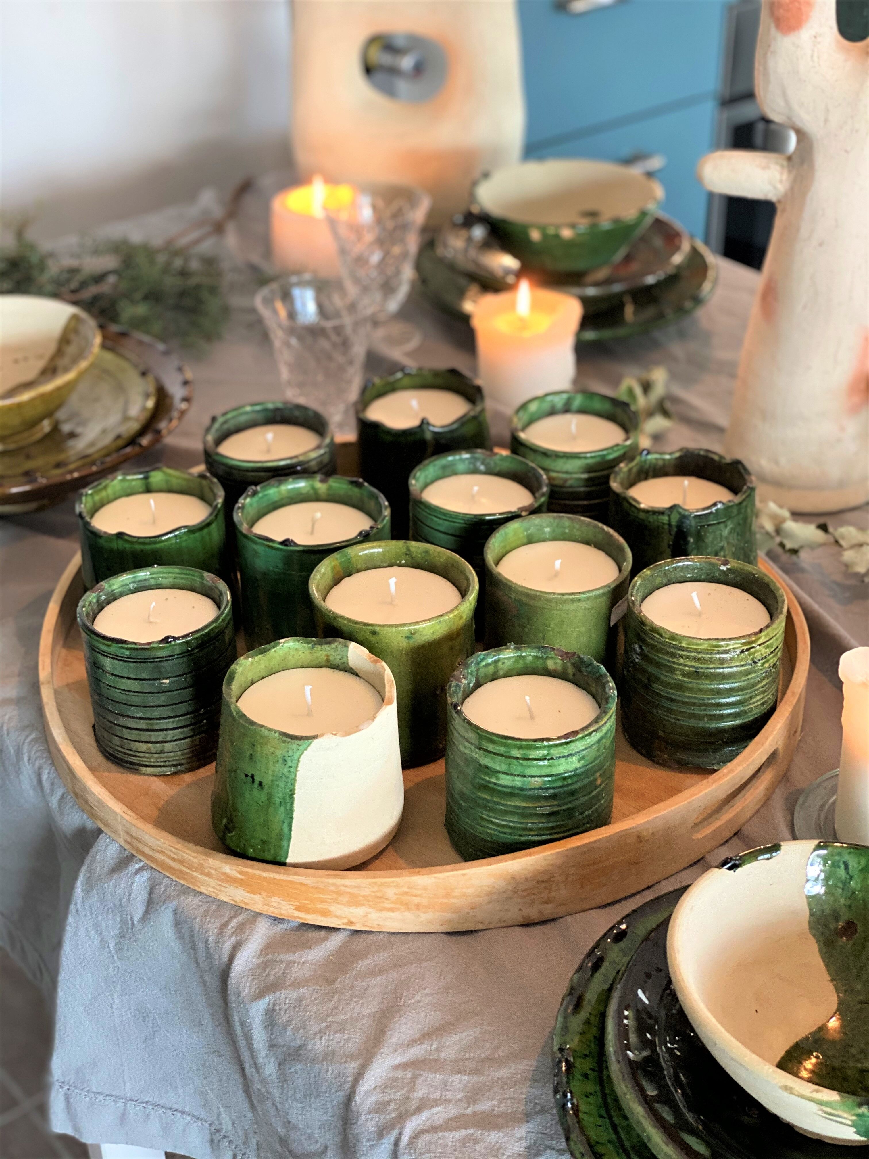 Candle placed in terracotta pottery
