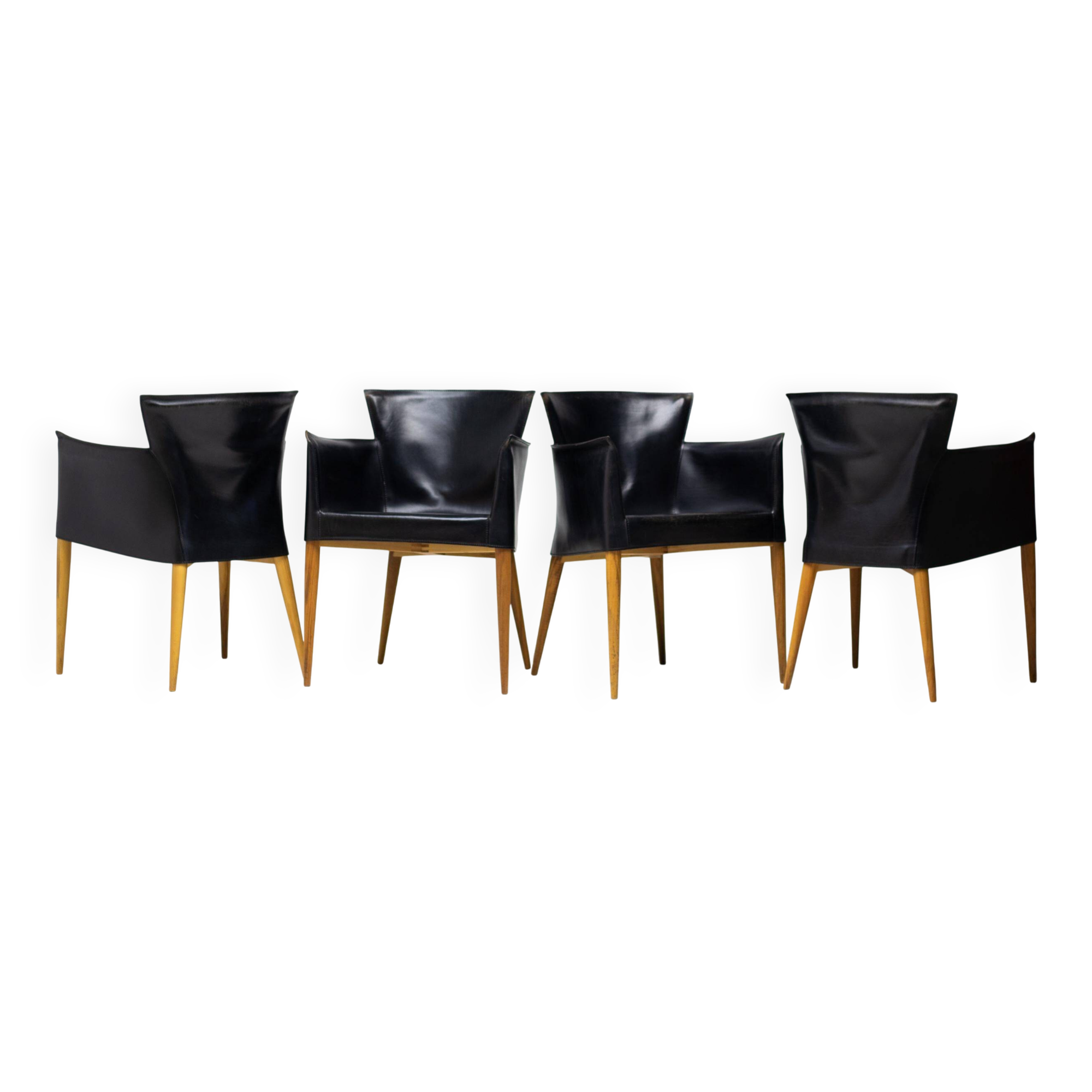 Set of four Vela leather armchairs by Carlo Bartoli - Italian modern elegance.