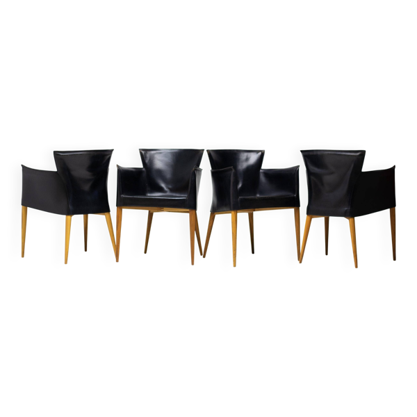 Set of four Vela leather armchairs by Carlo Bartoli - Italian modern elegance.