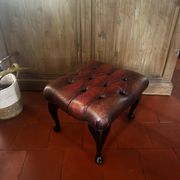 Red leather footrest in Chesterfield style, vintage 1970s.