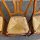 4 country-style Louis Philippe medallion chairs with rush seats from the 1970s.