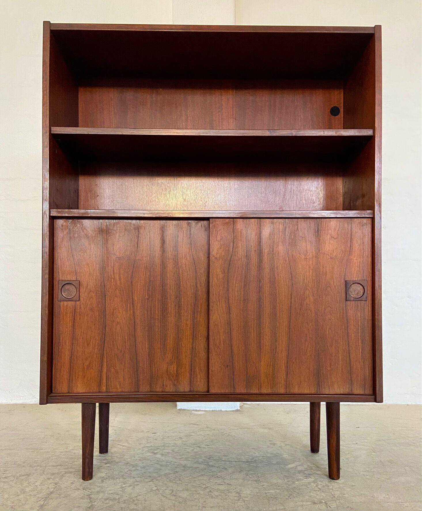 Danish retro vintage library in rosewood with sliding doors from the 1960s.