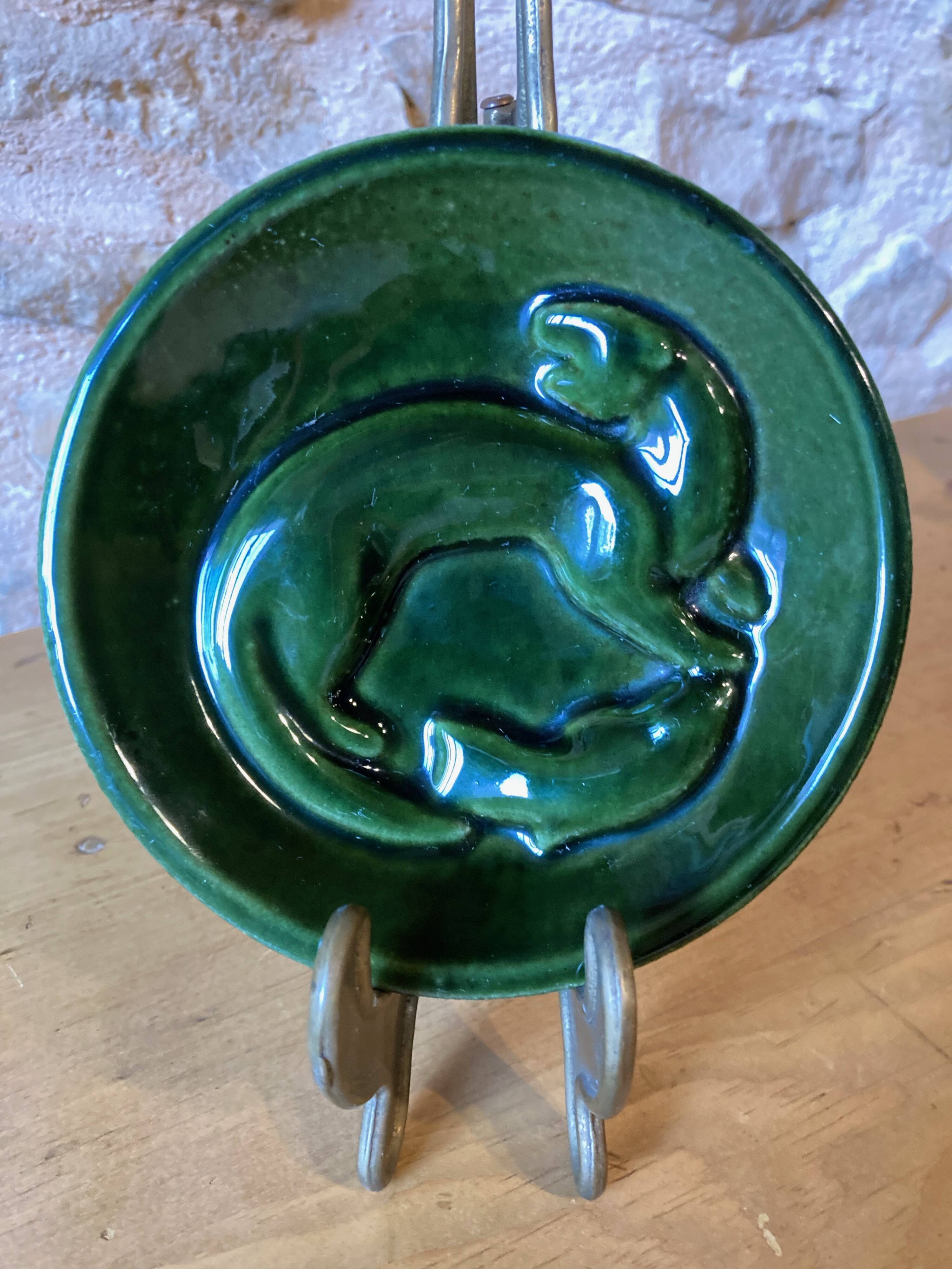Pocket tray or ashtray with otter and fish in enameled cast iron, Finland, 1960s