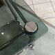 Vintage 1950s silver metal bar cart with wheels and two glass shelves