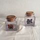 Duo of glass with Cork jars