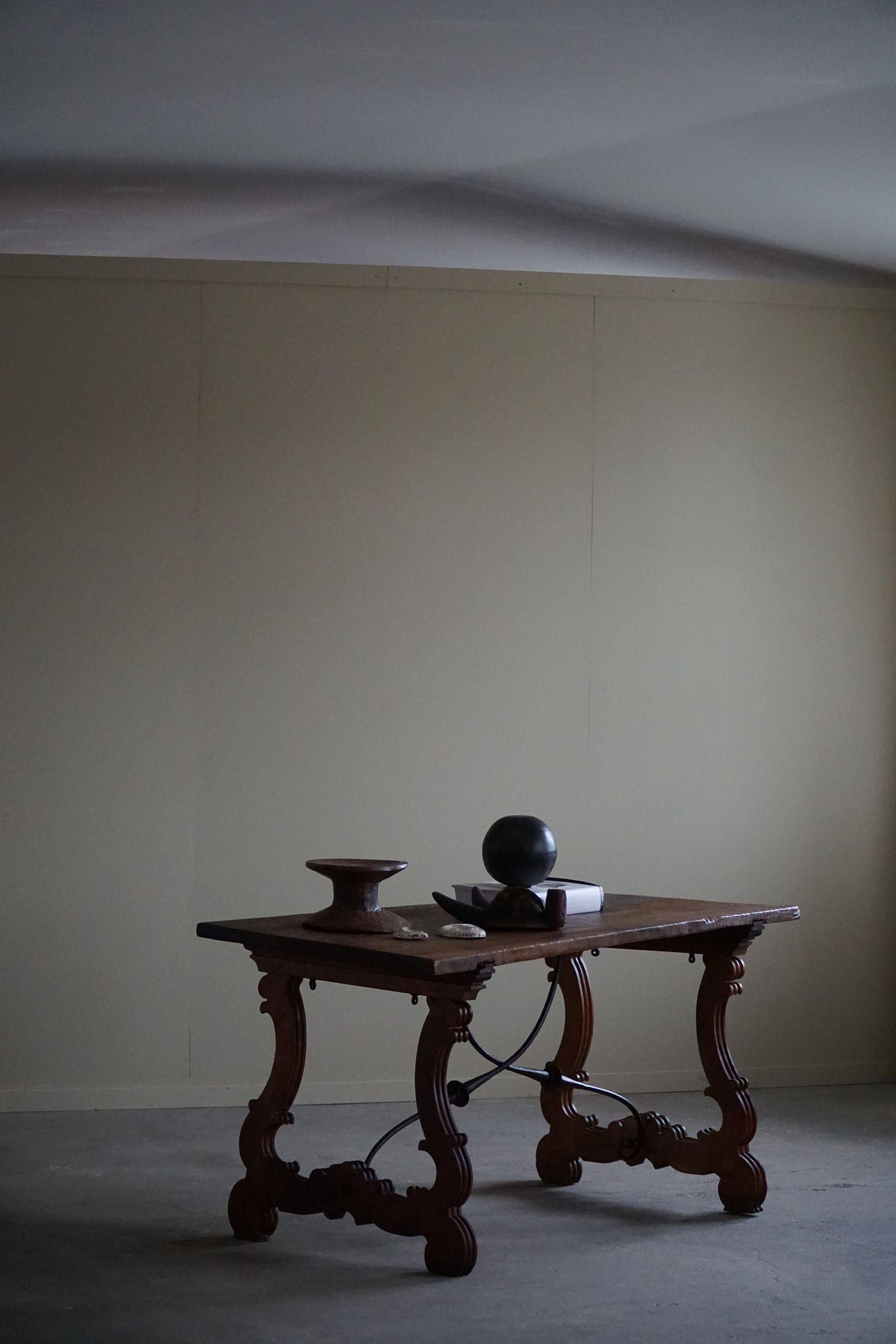 Brutalist table in antique Spanish solid oak and wrought iron, 19th century.