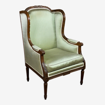 Louis XVI style shepherdess armchair in carved walnut and beige and green satin