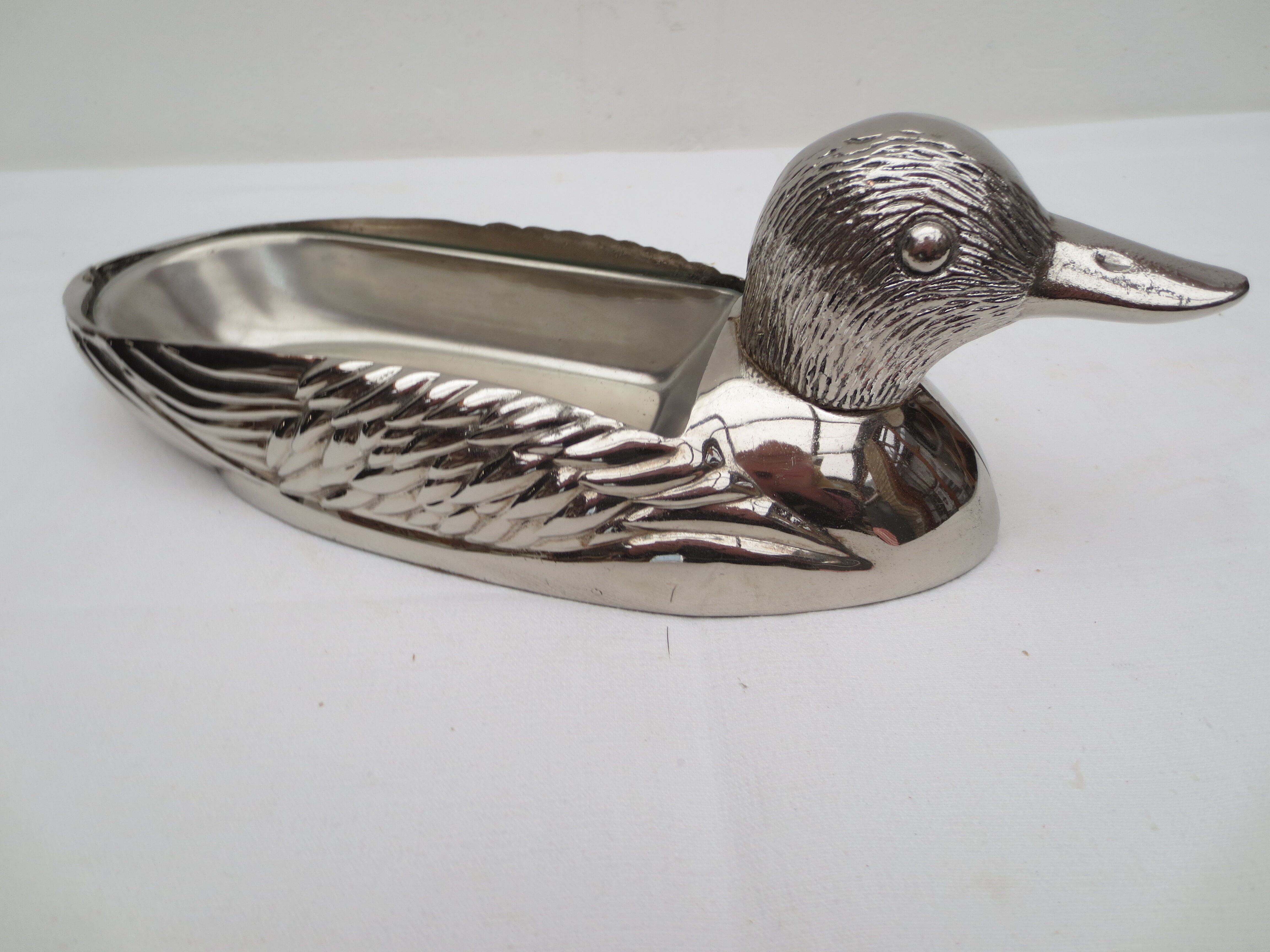 Foie gras dish in silver metal, duck décor