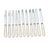 Set of 11 large silver metal knives