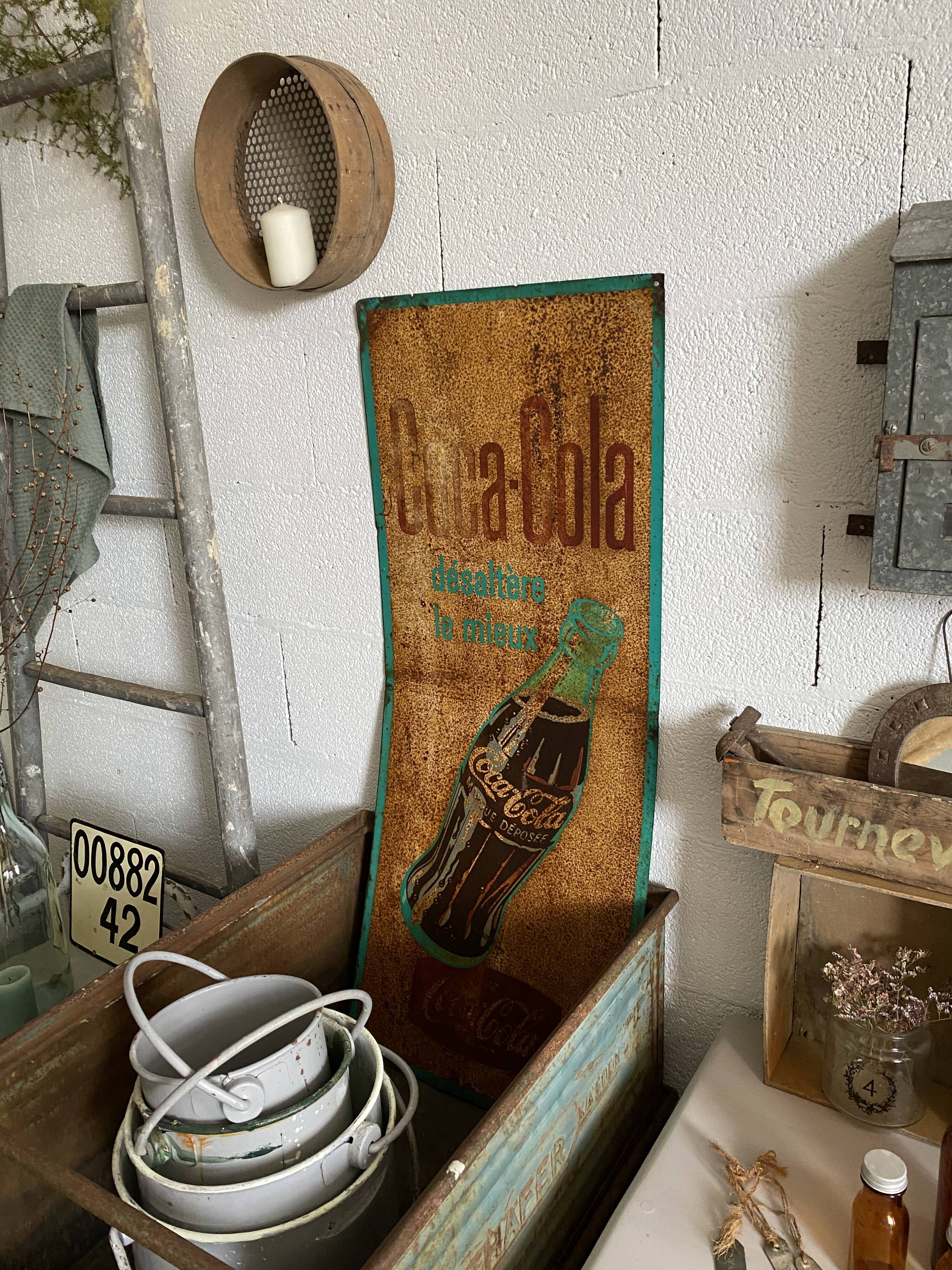 Coca-Cola advertising plaque