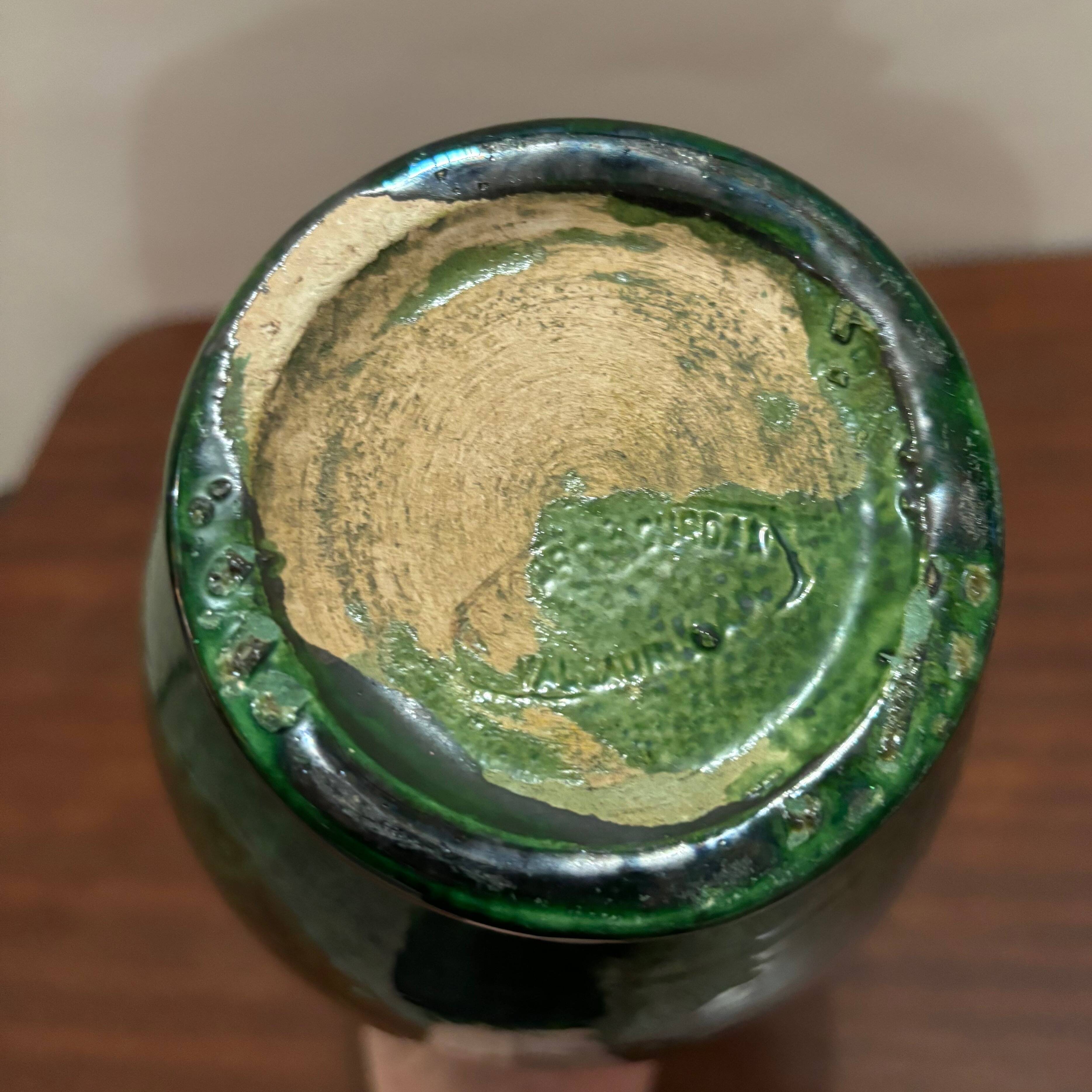 Green glazed ceramic pitcher