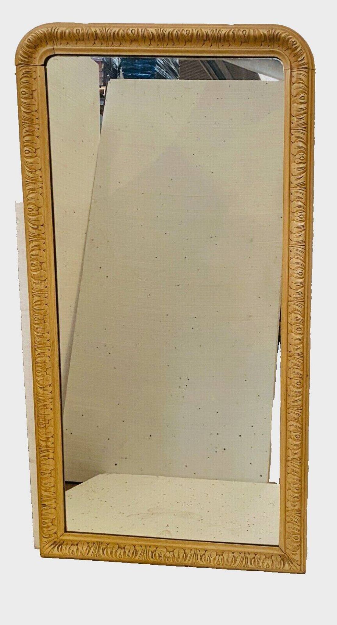 Louis Philippe mirror in wood and patinated stucco, 19th century.