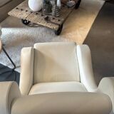 Armchair with rotating central foot