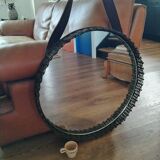 Old rattan mirror with leather strap