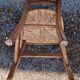 Antique straw chair with low back