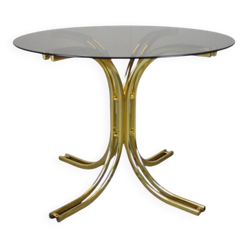 Round dining table in brass and glass / Italy, 1980s