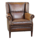 Fauteuil en cuir de mouton avec finition clous décoratifs