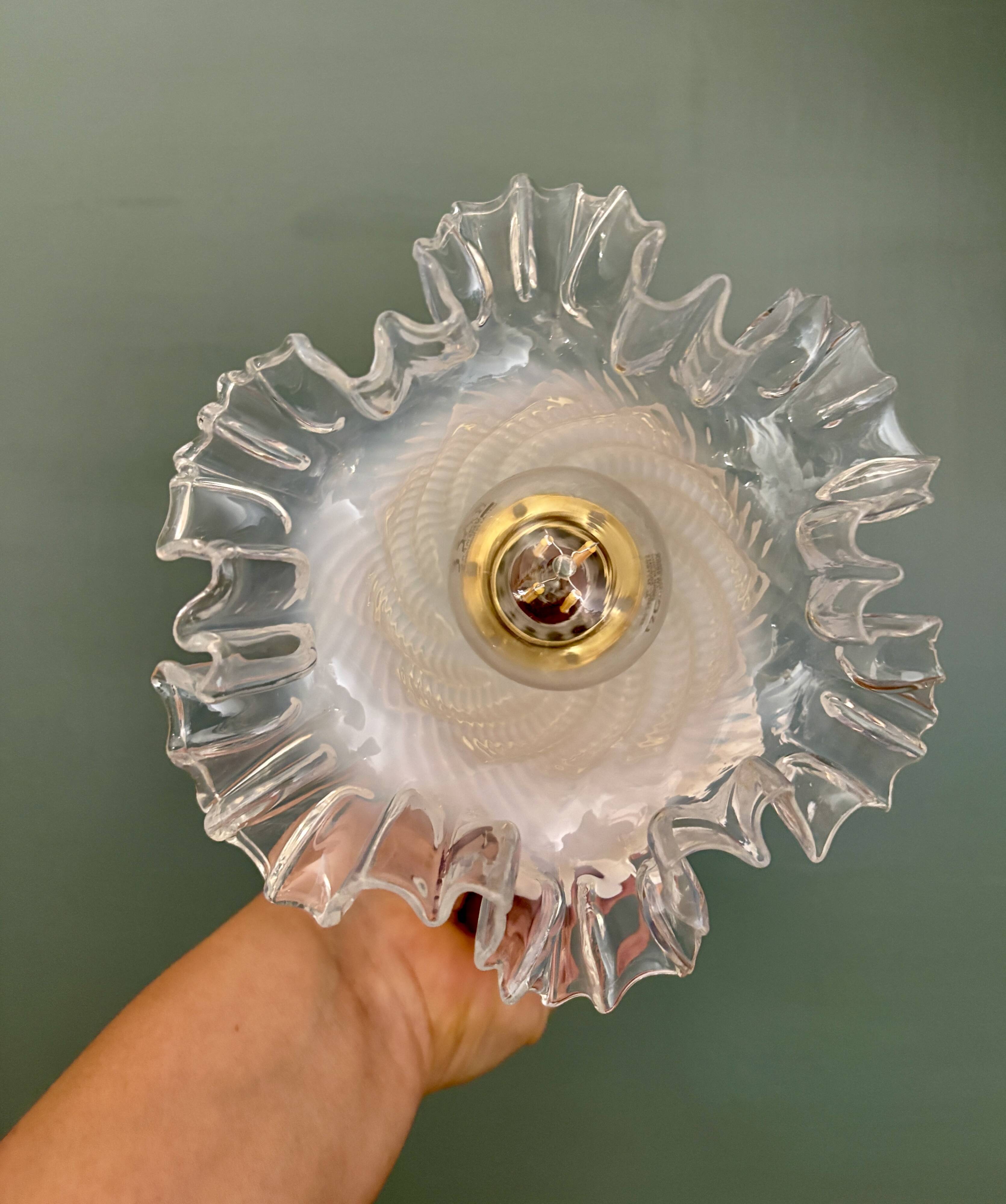 Vintage tulip glass wall light in transparent, slightly pearlescent white.