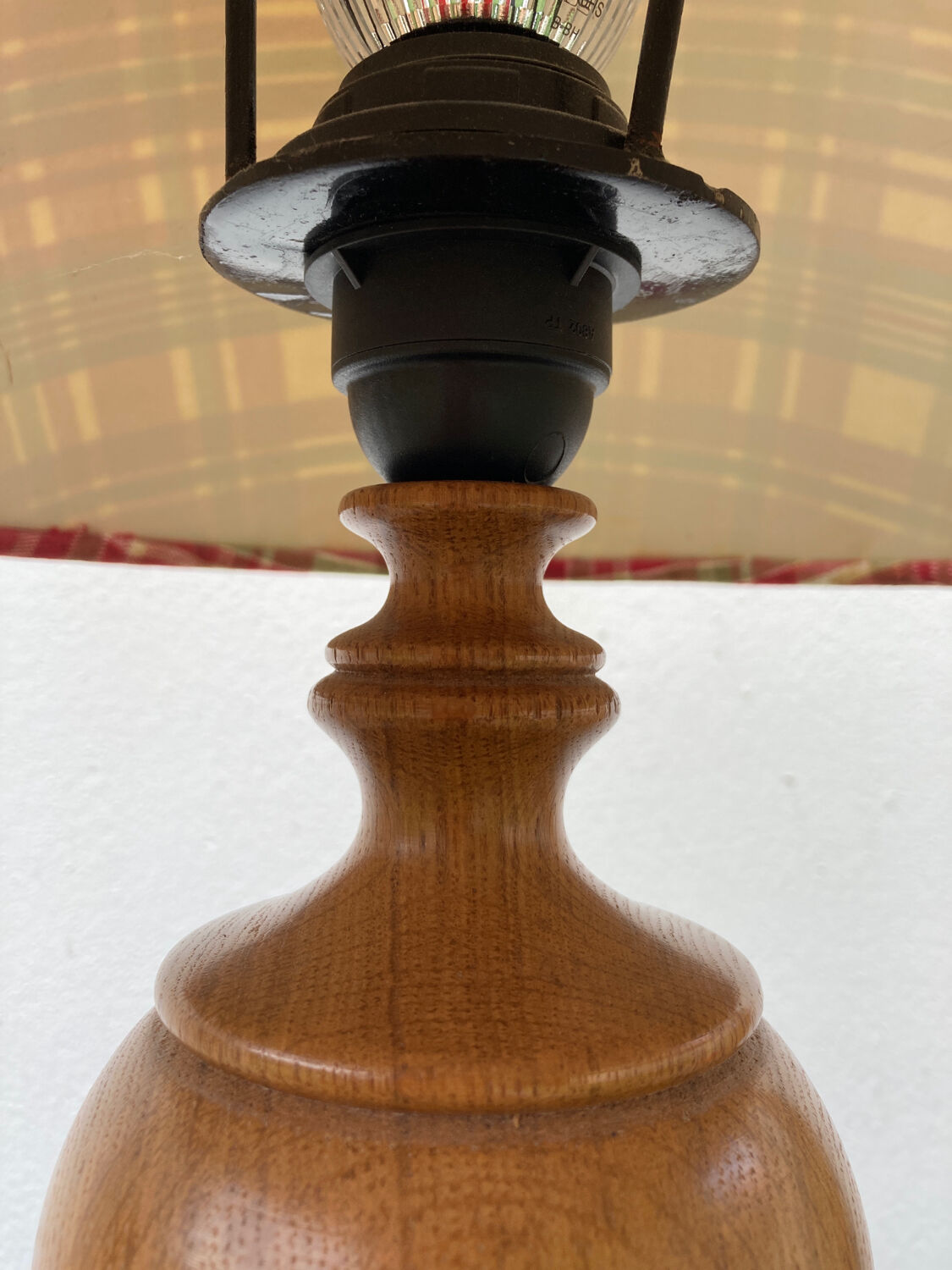 Wooden lamp and vintage red and green striped lampshade