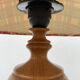Wooden lamp and vintage red and green striped lampshade
