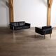 Horst Brüning Model 6912 two seater sofa in black leather for Kill International, Germany 1967