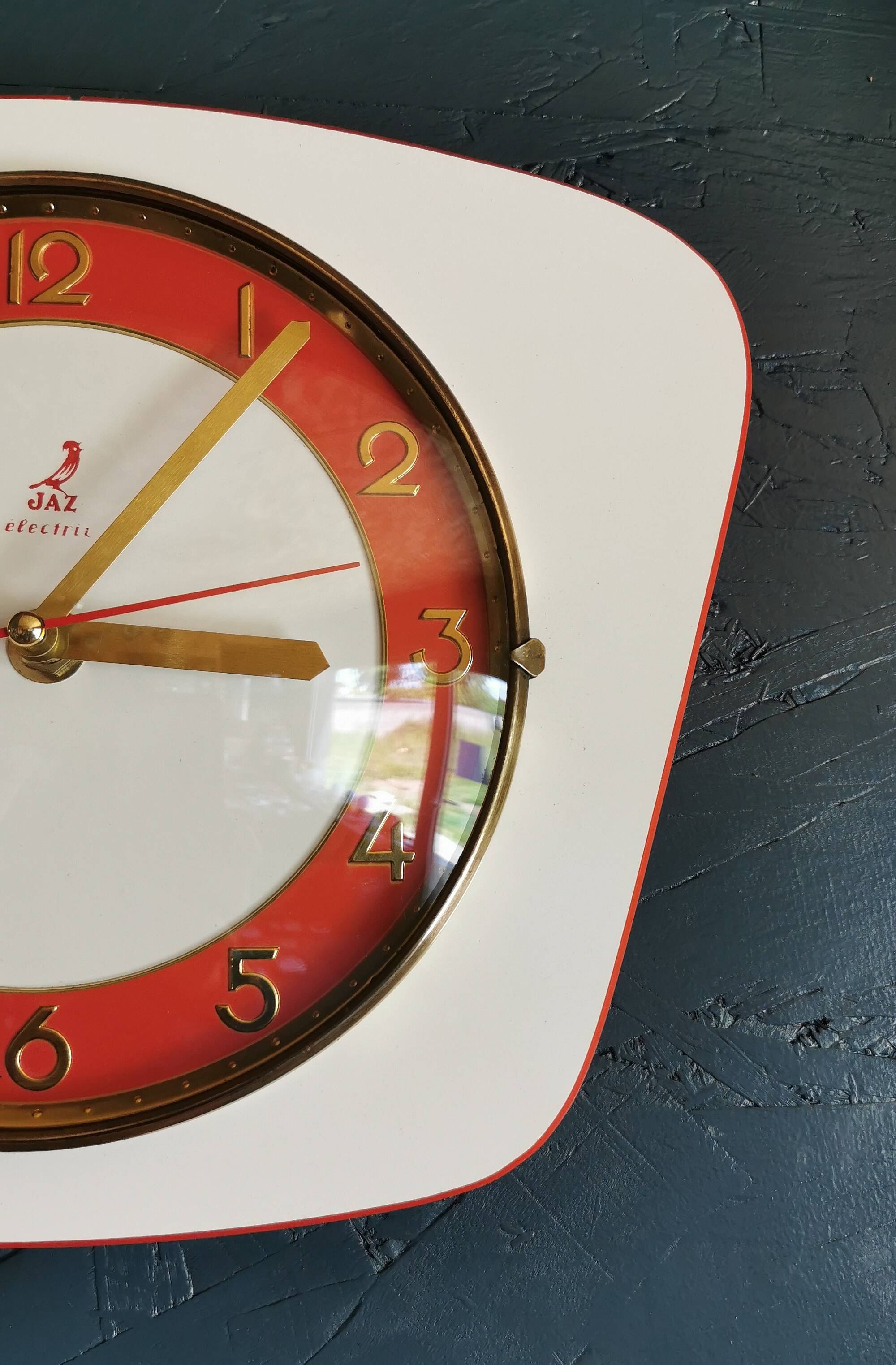 Vintage Formica clock silent trapeze wall pendulum "Jaz white orange"