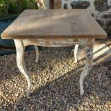 Antique square table with curved legs