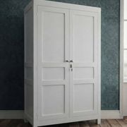 Antique Parisian wardrobe in white wood with shelves from the 1950s.