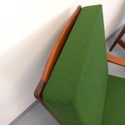 Pair of vintage Scandinavian armchairs in teak and green fabric from the 1960s.