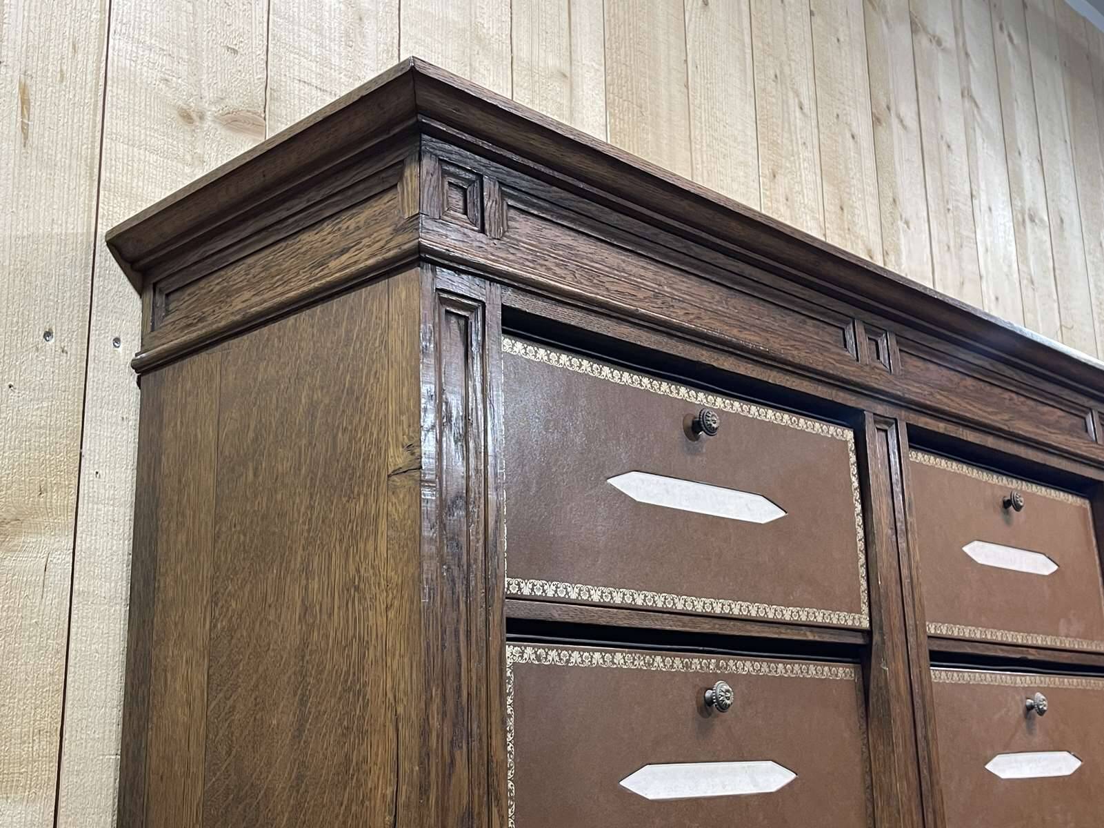 Notary's furniture from the early 20th century in oak with its cardboard box.