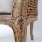 Louis XV style carved armchair with double sided cane work on the side panels