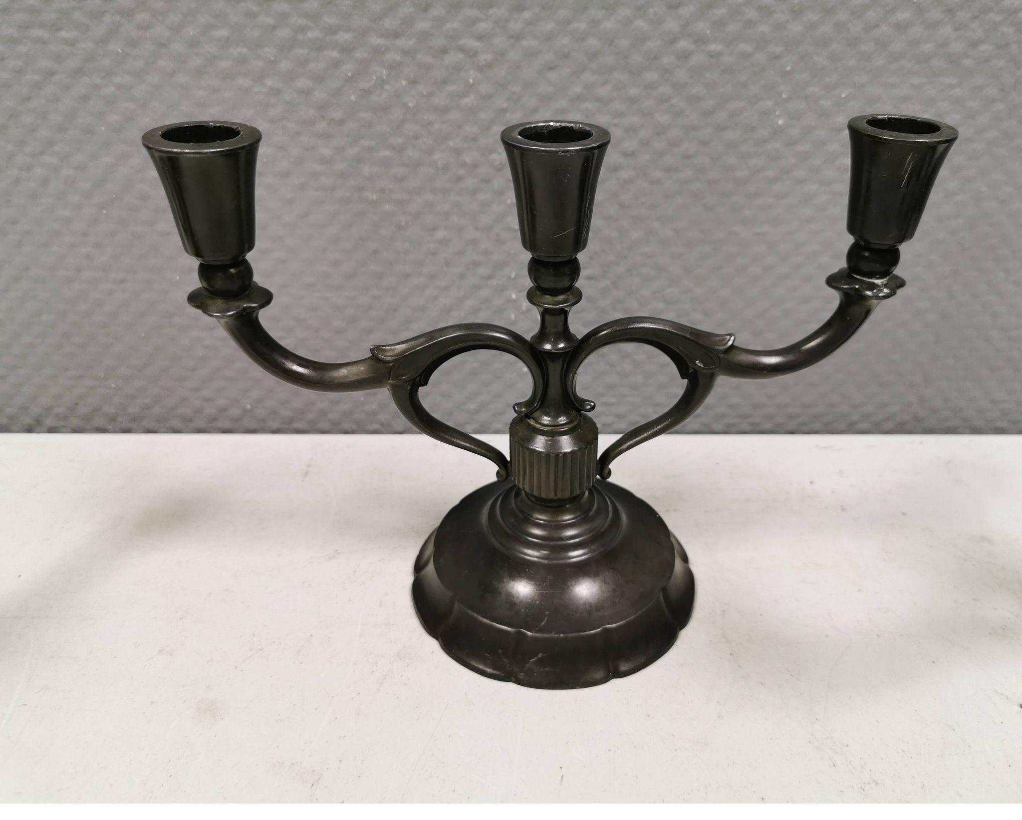 Three-armed candlesticks by Just Andersen, in Disco metal, Denmark, 1950s