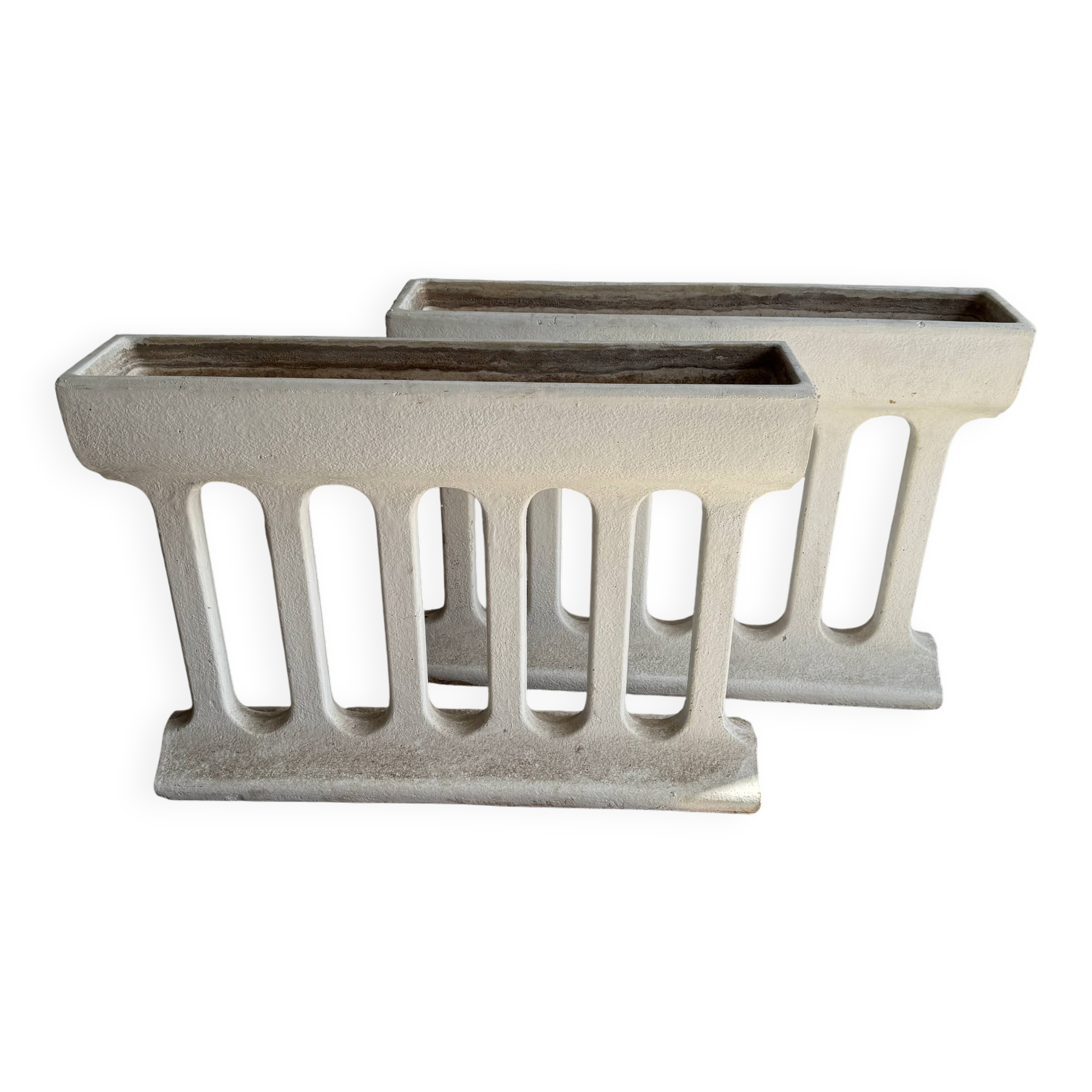 Pair of sculptural cast concrete planters in Off-White, mid-century brutalist style, long and rectangular.