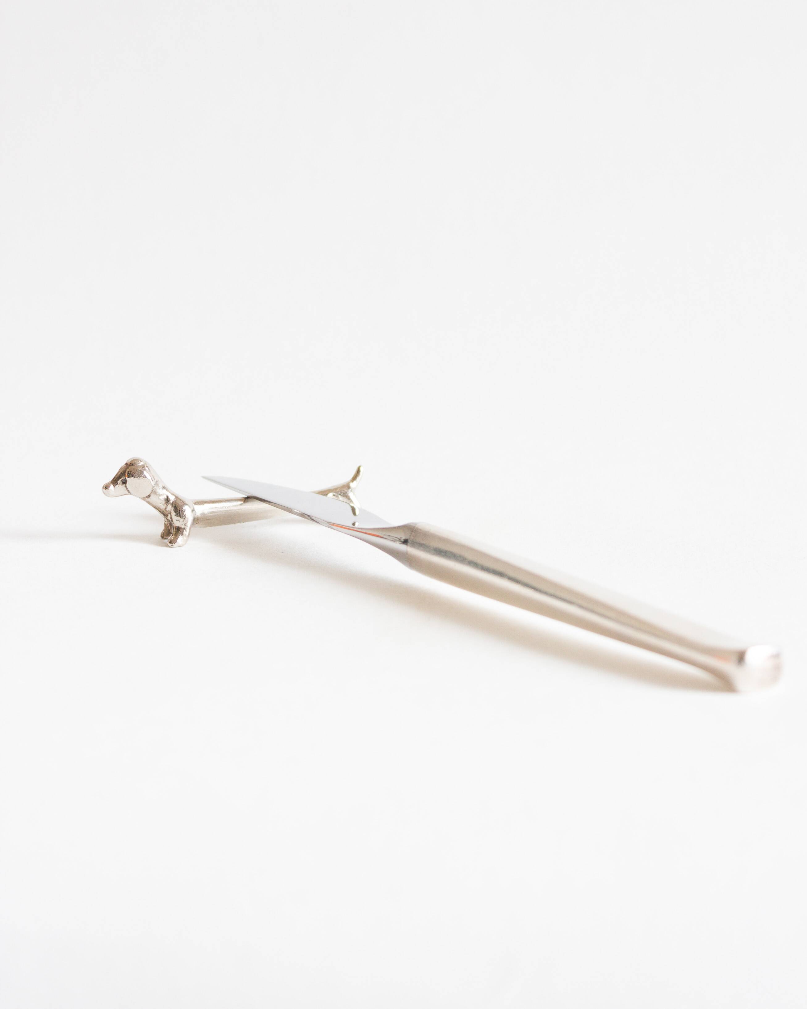 Set of six dachshund-shaped knife holders, 1970s