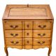 Louis XV style writing desk with a curved back.
