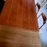 Table with two extensions and its 6 chairs scandinavian teak of the 1970s