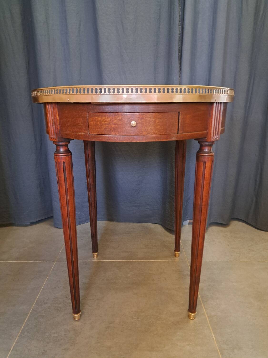 Mahogany and marble bouillotte table
