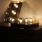 Pair of smoked glass wall lamps, mirrored bottom, Italy 70s