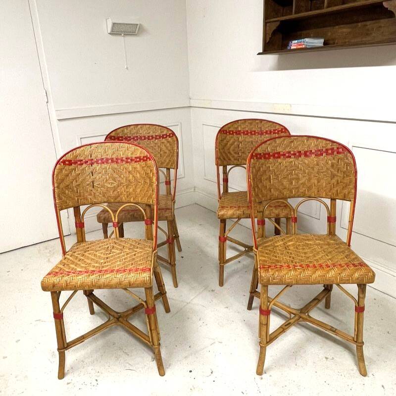Set of 4 antique chairs in woven red and natural rattan.
