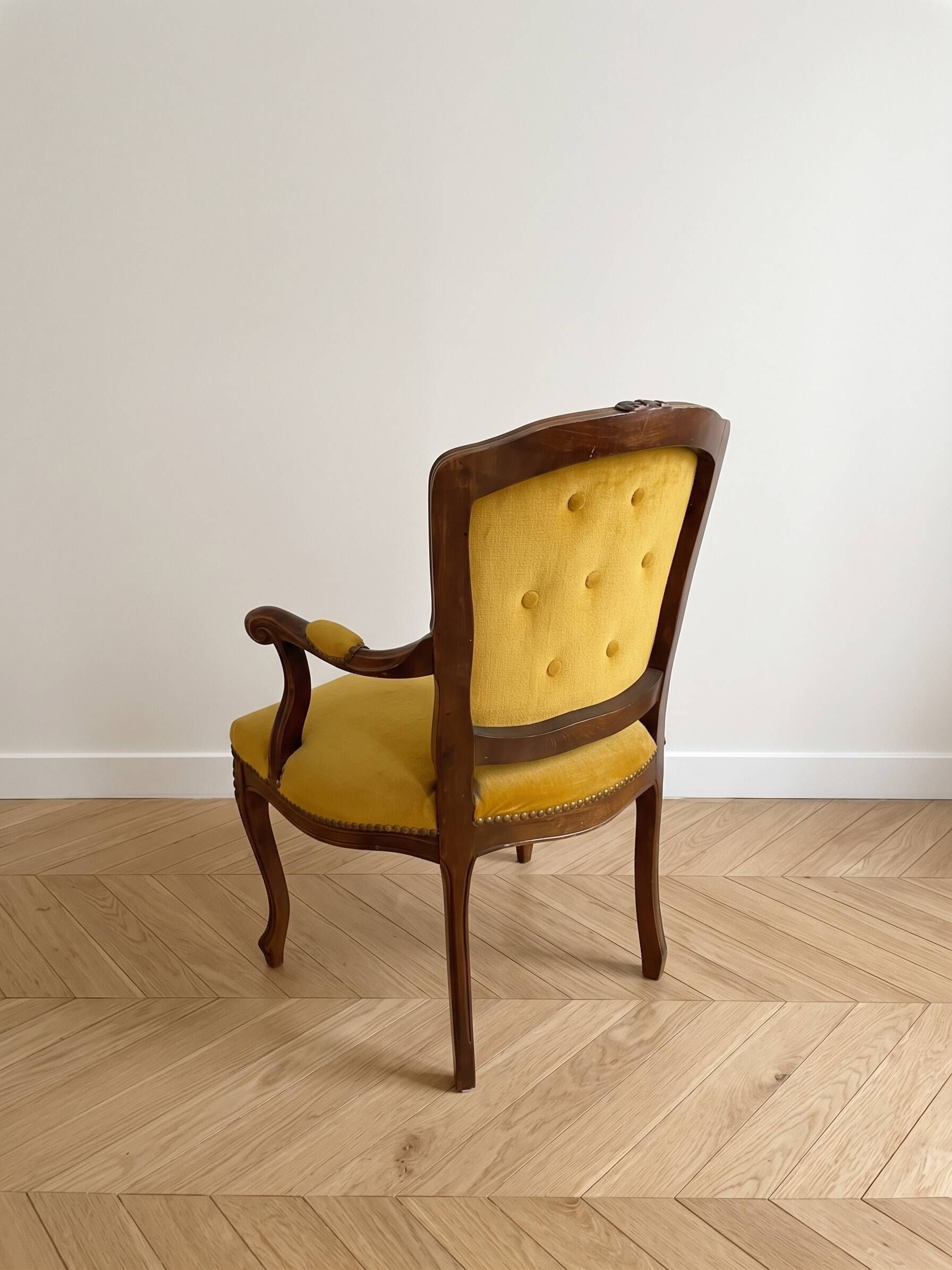 Louis XV style armchair in yellow velvet.
