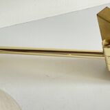 articulated brass and velvet wall light