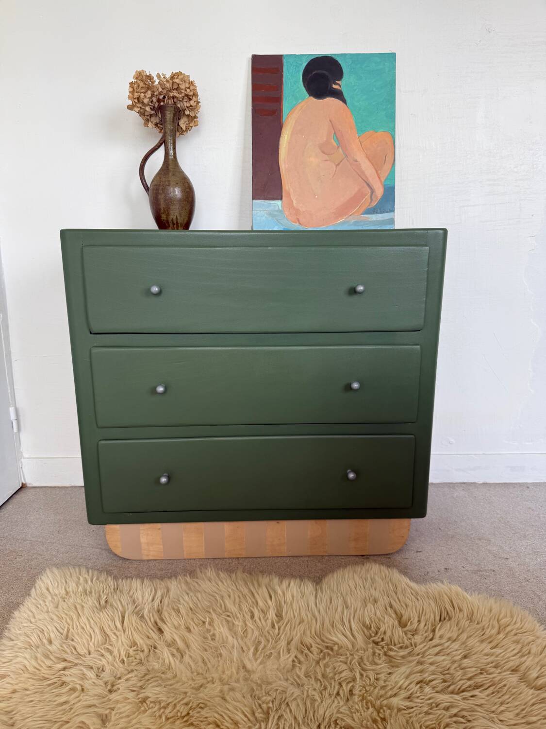 Vintage olive green chest of drawers with striped base