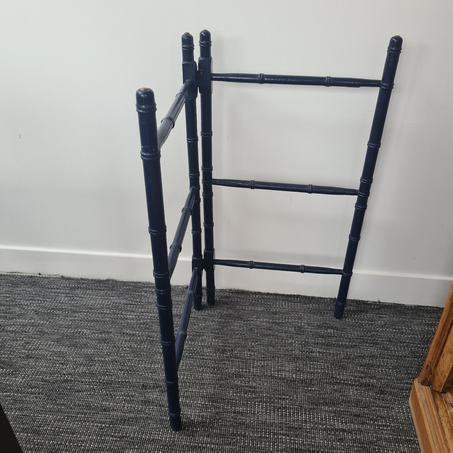 Wooden towel rail painted navy blue