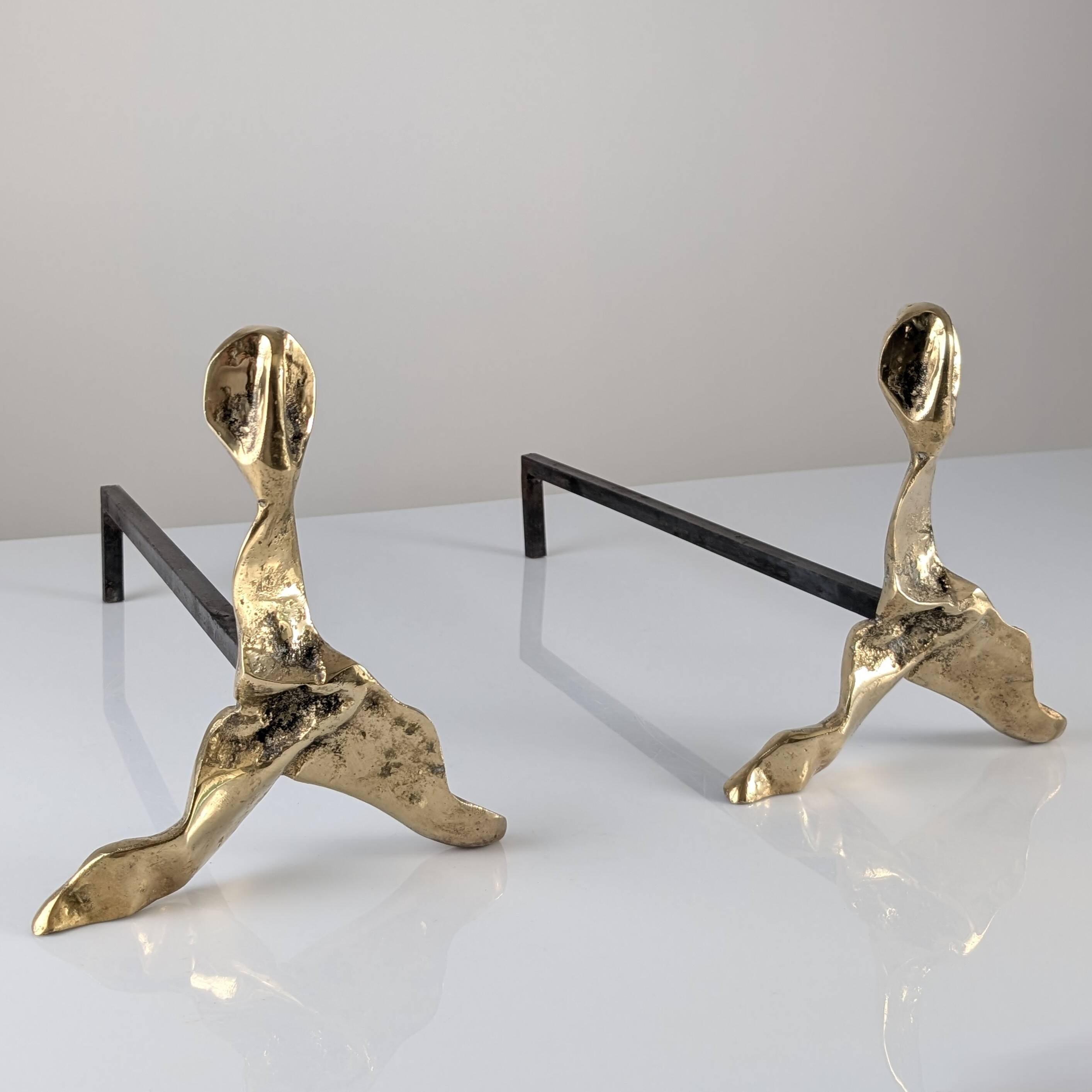 Pair of sculptural brutalist bronze fireplace andirons, 1970s
